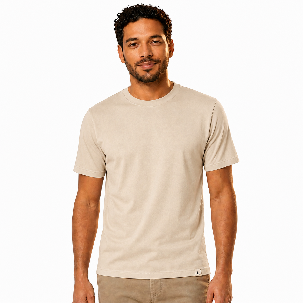 The Signature Tee in Beige — worn by model