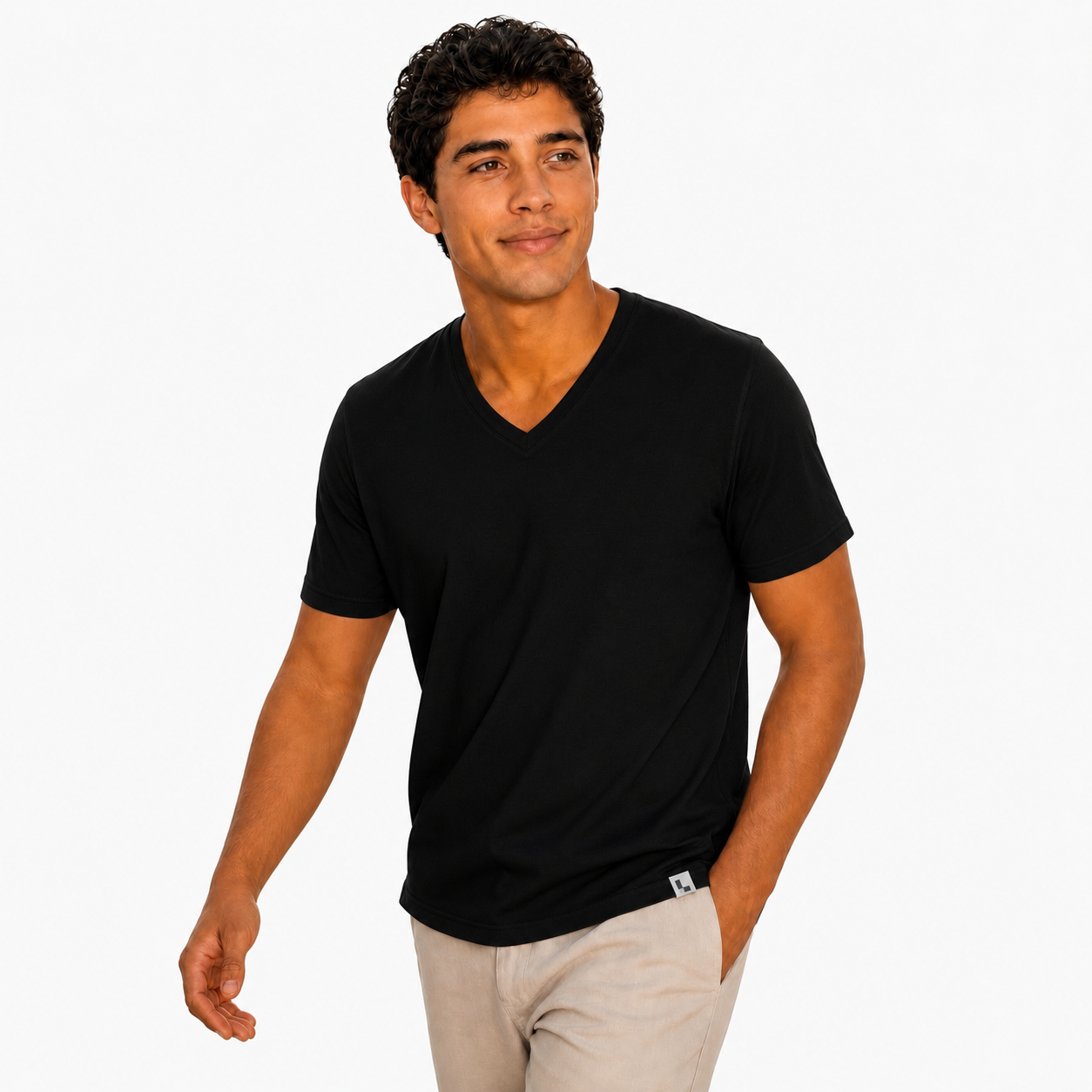 The V-Neck Tee in Black — worn by model